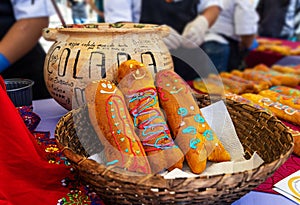 Ecuadorian bread Guagua or bread figure and the drink Colada Morada