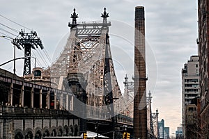 Ed Koch Queensboro Bridge in New York City during daytime against a cloudy sky