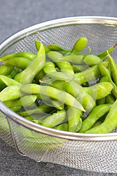 Edamame nibbles, boiled green soy beans