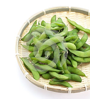 Edamame nibbles, boiled green soy beans, japanese food