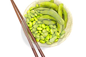 Edamame nibbles, boiled green soy beans, japanese food