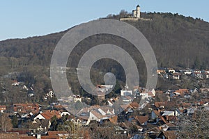 Eddigehausen in the snow with castle ruins Plesse castle