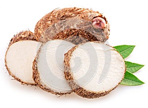Eddoe or taro tubers and its slices isolated on white background