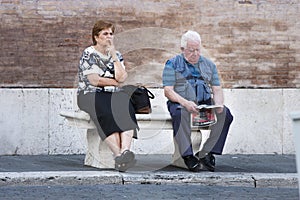 Ederly couple sitting on a bench