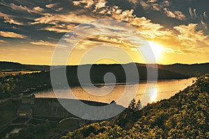 Edersee dam wall Germany in the sunset. Clouds in the sky