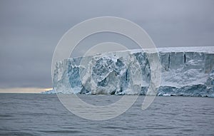 Edge of the Arctic island covered with glacier