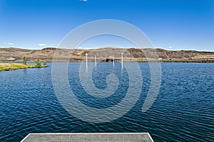The edge of the dock on the Columbia River at the boat launch at Vantage, Washington, USA photo
