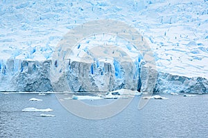 Edge of glacier, glacier front, with blue and turquoise light in pressed ice, Neko Harbour, Antarctica