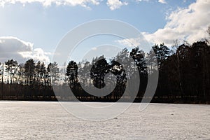 Edge of ice on the sand on the beach