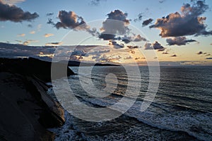 edge of steep and rugged cliffs at the gulf of biscay bay