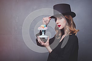 Edhead girl in top hat with marshmallow