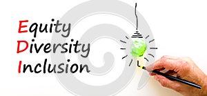 EDI equity diversity inclusion symbol. Concept words EDI equity diversity inclusion on white paper. Beautiful white background.