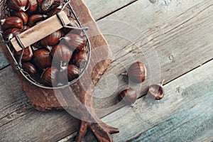 Edible chestnuts in a metal basket