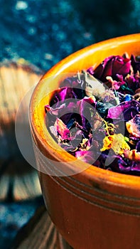 edible roses petal in a wooden pot