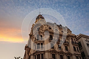 Edificio Banco Central Building at sunset - Granada, Andalusia, Spain photo