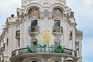 Edificio Grassy building with the Rolex sign one of the most beautiful buildings on Gran Via street in Madrid, Spain