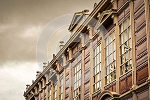 Edificio Metalico building facade in San Jose, Costa Rica with a cloudy sky background photo