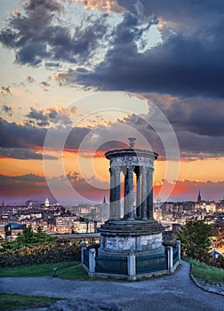 Edinburgh against sunset with Calton Hill in Scotland