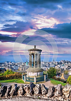 Edinburgh against sunset with Calton Hill in Scotland