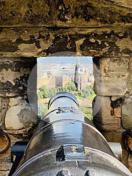 Cannons of the Edinburgh Castle a historic fortress which dominates the skyline of the capital city of Scotland, from its position photo