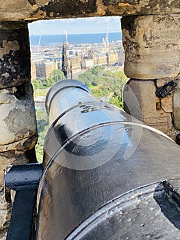 Cannons of the Edinburgh Castle a historic fortress which dominates the skyline of the capital city of Scotland, from its position photo