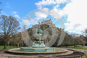 Edinburgh Castle and Ross fountain from the Princes Street gardens in Edinburgh, Scotland