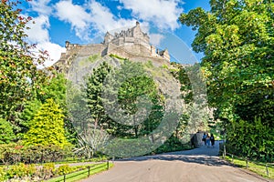 Edinburgh Castle in a summer afternoon as seen from Princes Street Gardens, Scotland.