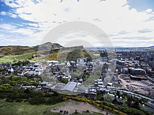 Edinburgh city historic Arthur Seat sunny Day Aerial shot