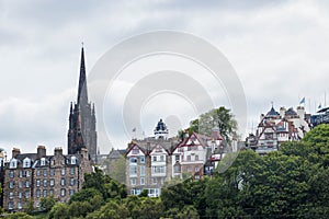 Edinburgh cityscape between trees