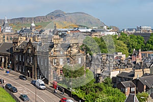 Cityscape medieval city of Edinburgh with Arthur`s Seat mountain