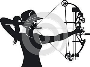 Female aiming with compound bow photo
