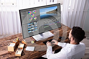 Editor Editing Video On Computer photo