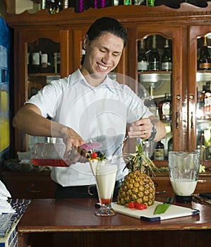 editorial bartender mixing drink in restaurant Corn Island Nicaragua