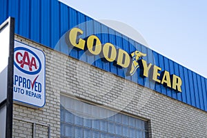A sign of a Goodyear location. A manufacture of tires for passenger vehicles, commercial
