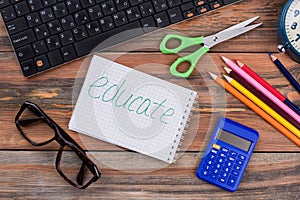 Educate accessories on a wooden desk.