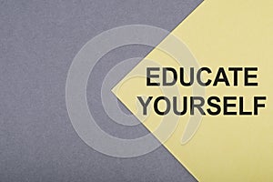 EDUCATE YOURSELF text on gray-yellow background
