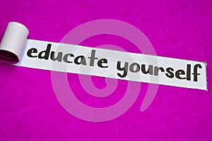 Educate Yourself text, Inspiration, Motivation and business concept on purple torn paper