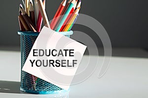 Educate Yourself text on stickers, concept background