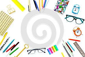 Education background, frame. School, student, office supplies. Stationery, glasses, alarm clock, notebook on white