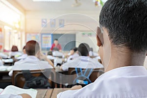 Education concept. the classroom environment in which the students are intending to study seriously