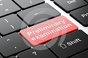 Education concept: Preliminary Examination on computer keyboard background photo