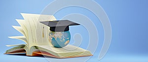 Education concept. 3d of The world wears a graduate hat on the book on blue background. Modern flat design isometric concept of