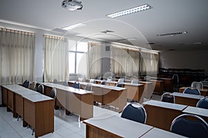 School classroom with window opened, clean and tidy ready for new students and semester start