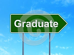 Education concept: Graduate on road sign background