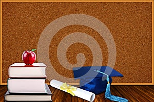 Education Concept With Graduation Hat, Diploma and Books on Cork board Background