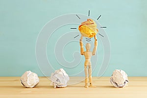 Education concept image. Creative idea and innovation. Crumpled paper as light bulb metaphor