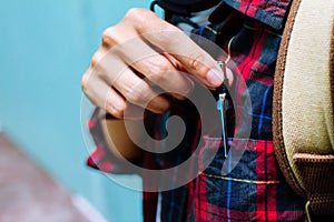 Education Concept. Man in Scottish shirt.Holding pen Waiting studying,learning