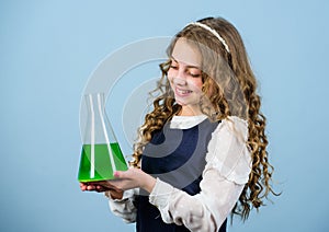 Education concept. School chemistry lesson. Chemical analysis. Harmful and vital options of chemical solute. Girl school