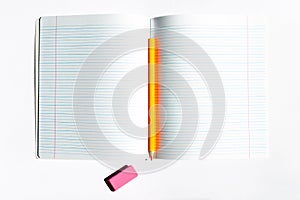 Education concept.Top view yellow pencil lined copybook,eraser.banner advertisement mock up.White background