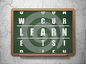 Education concept: word Learn in solving Crossword